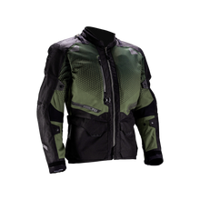 Green and black motorcycle jacket on a white background